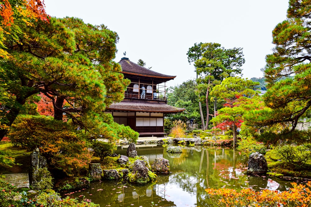 a pagoda building by a pond