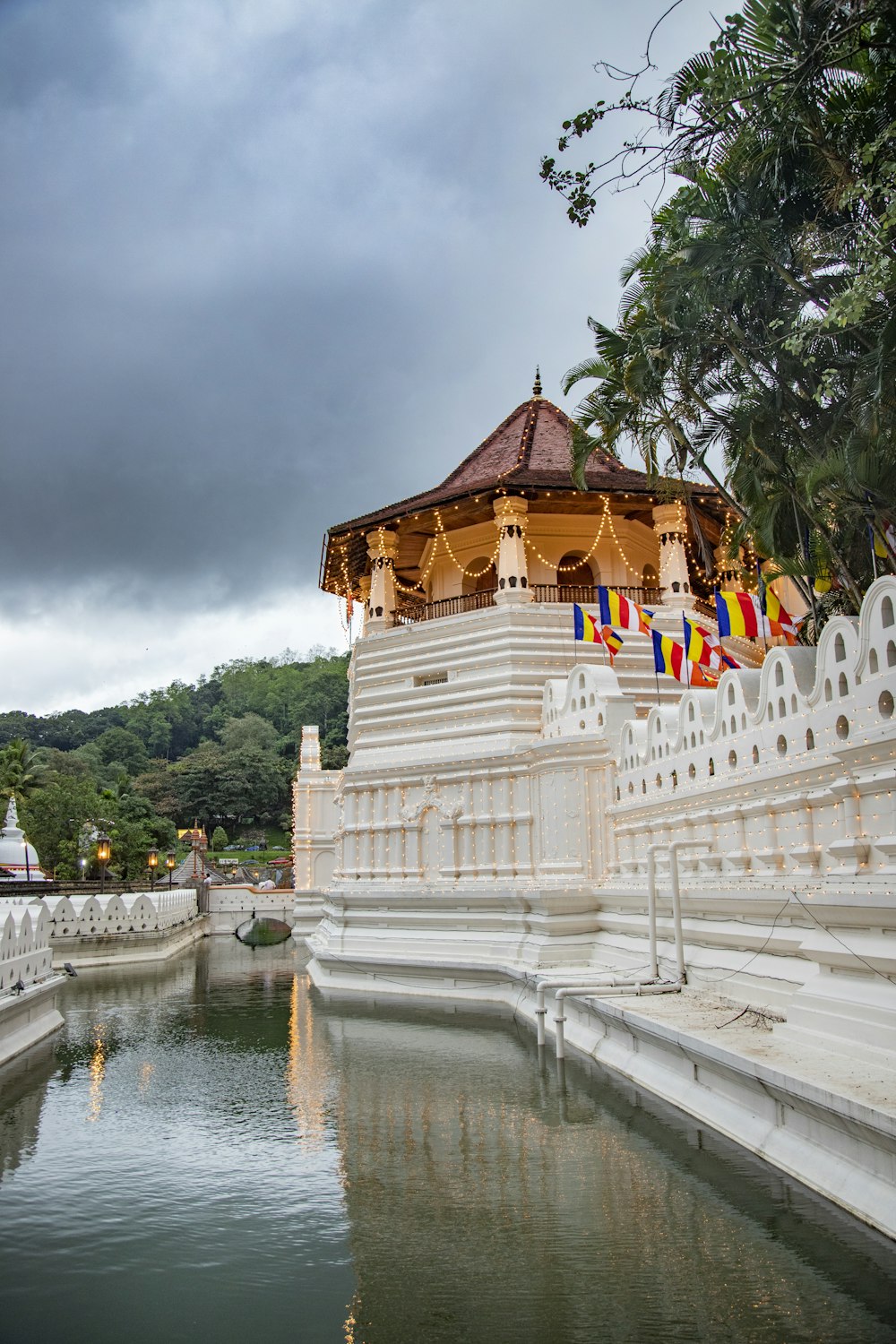 Temple of the Tooth with a bridge over water