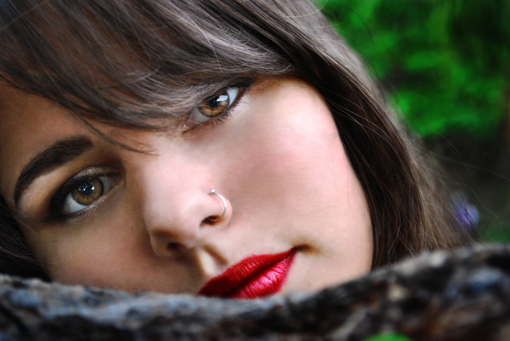 a woman with a red bow tie