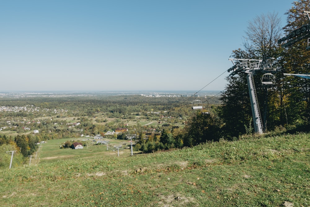 a grassy field with a power line