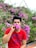a person holding a flower