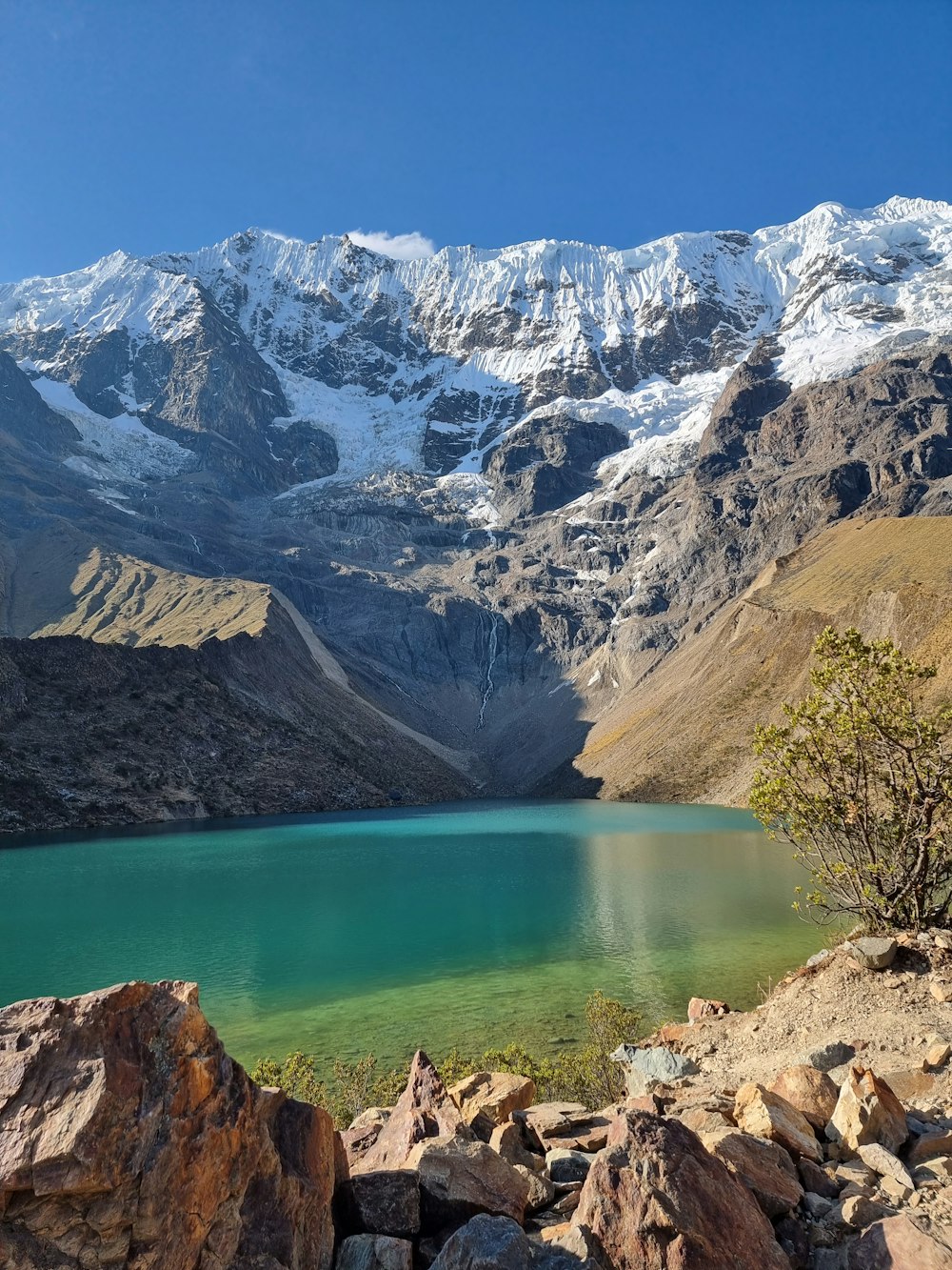 a lake surrounded by mountains