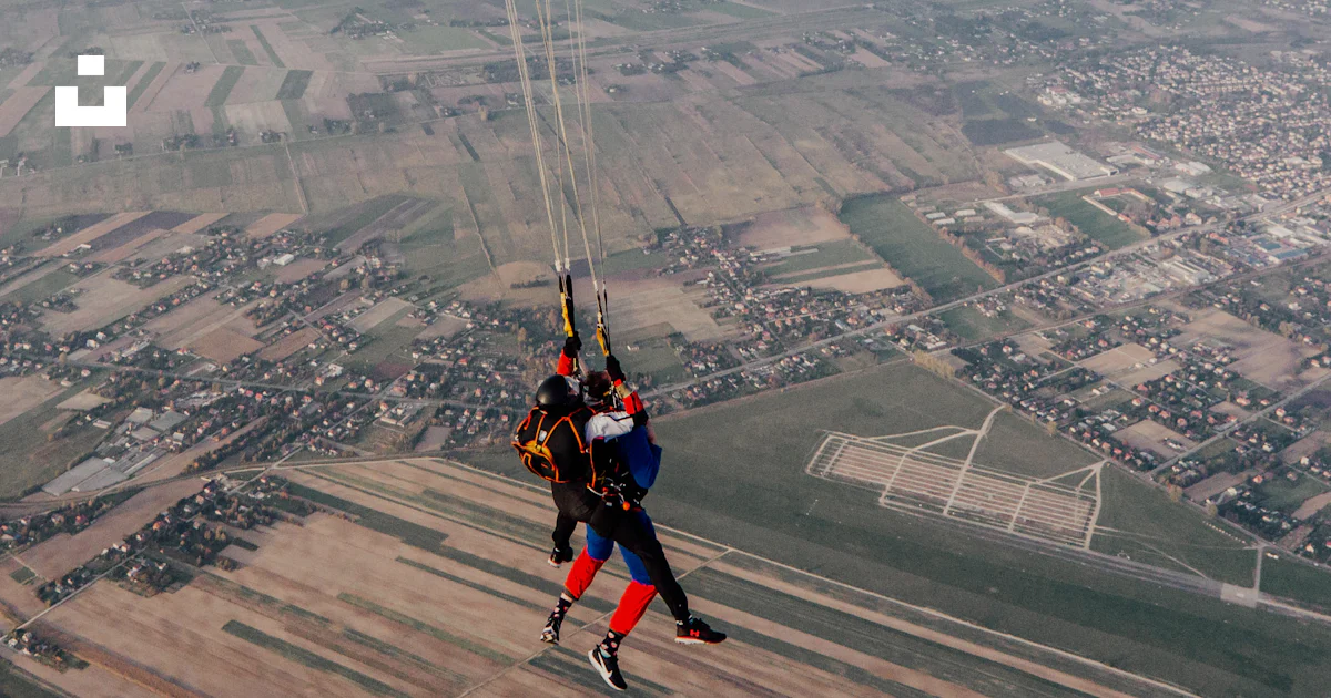 Parachuting In A person parachuting in the air photo – Free Adventure Image on Unsplash