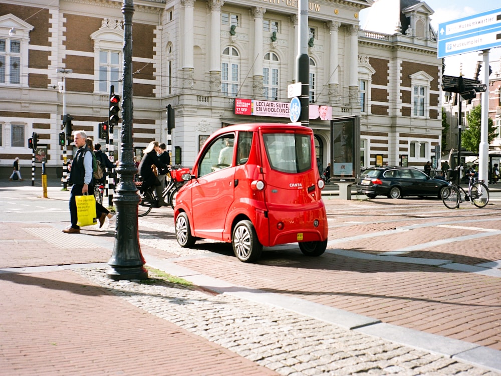 a red car on the street