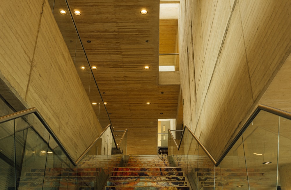 a large staircase with a glass ceiling