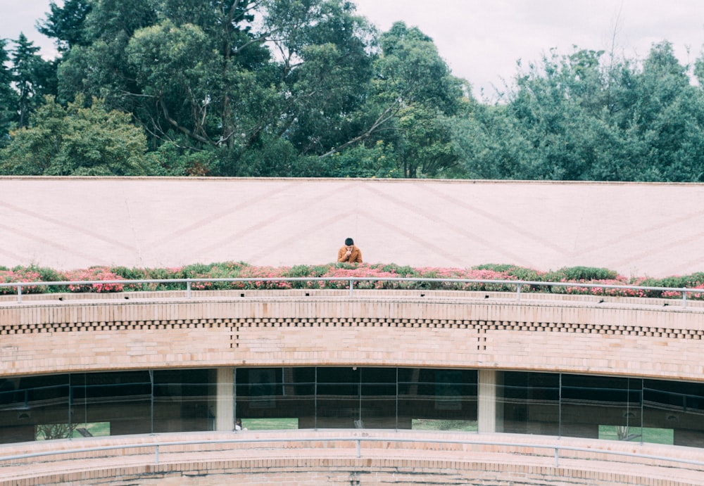 a person sitting on a roof