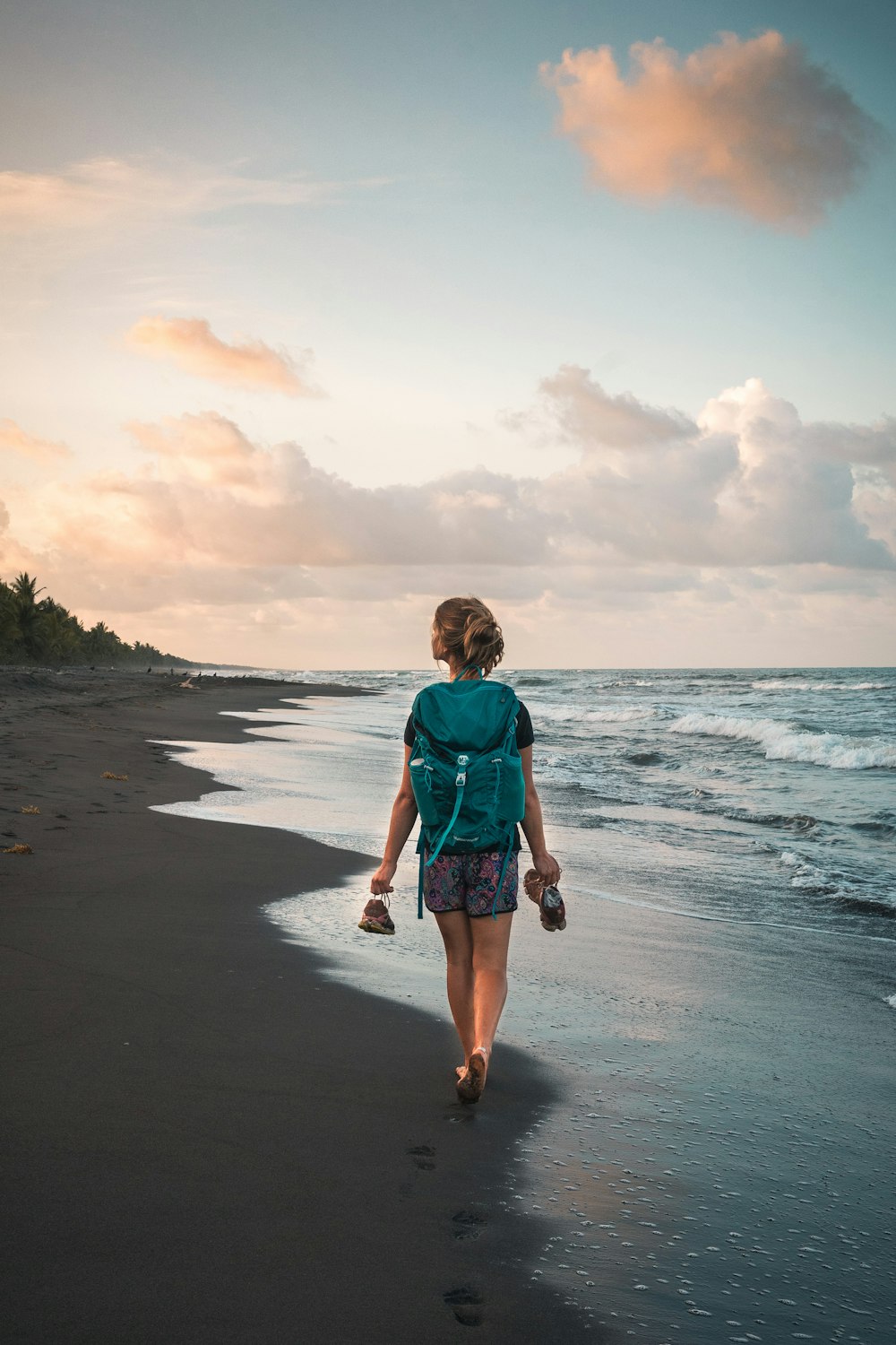 a person walking on a beach