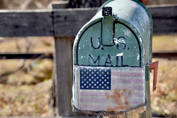 a metal object with a flag on it