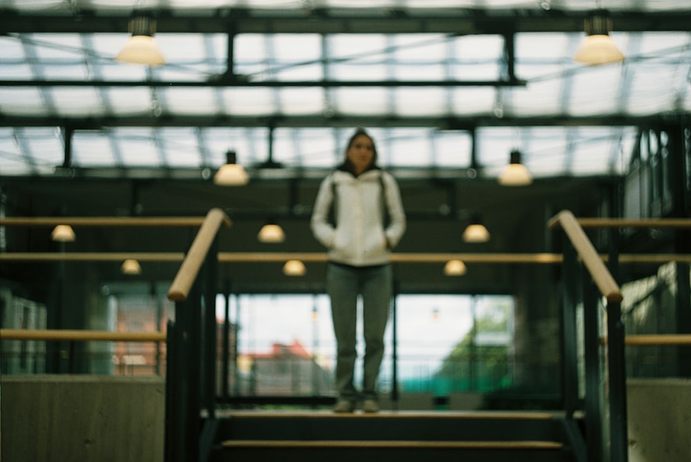 a person standing on a staircase