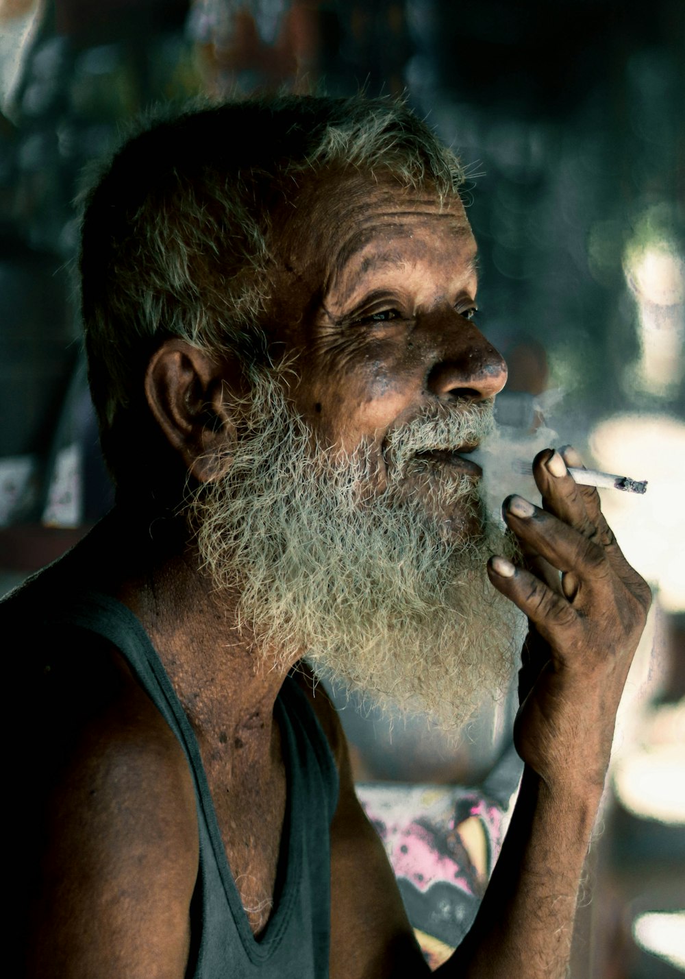 a man smoking a cigarette