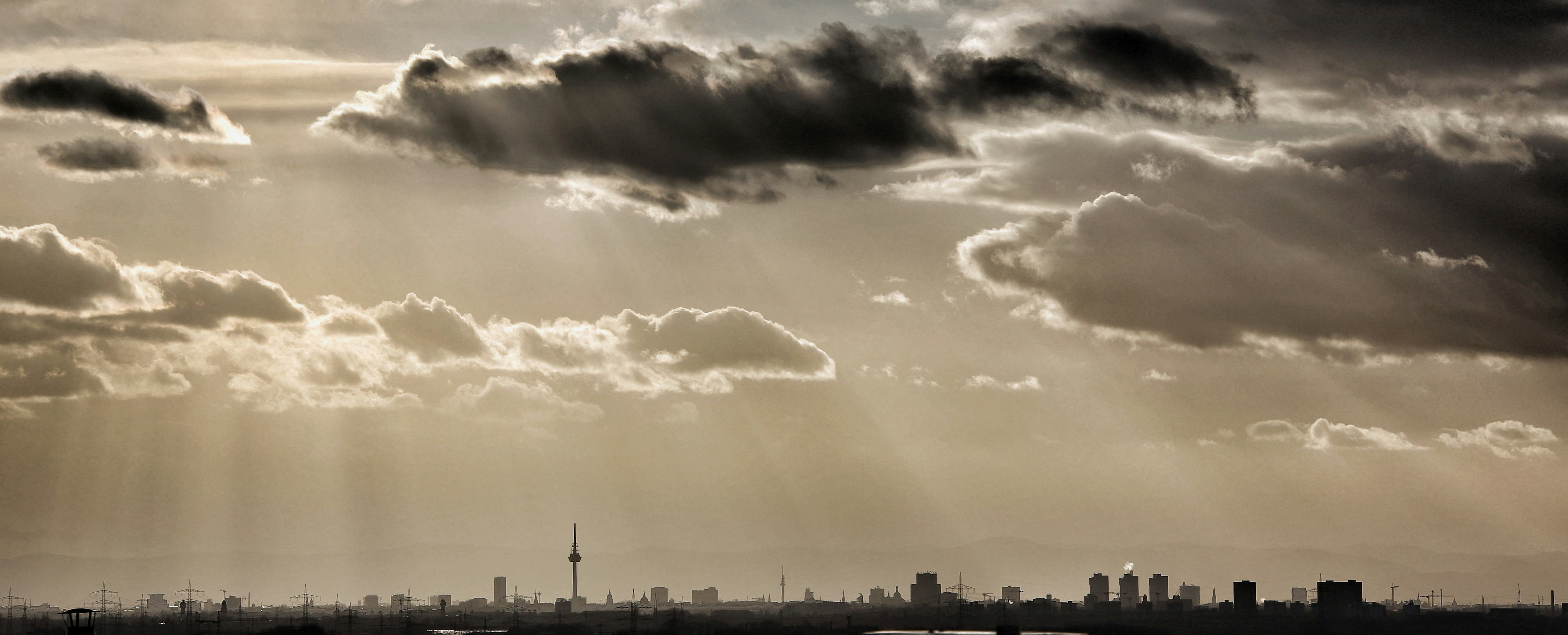 a city skyline with clouds