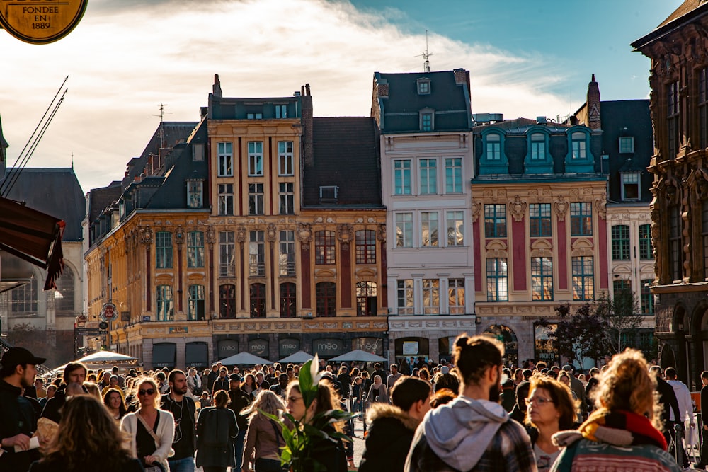 a group of people walking in a city