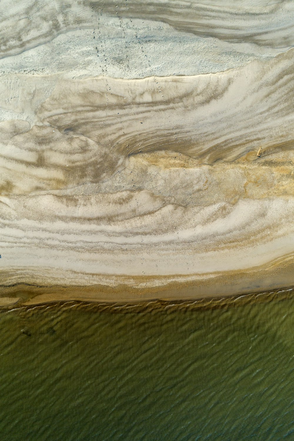 a wave crashing on a beach