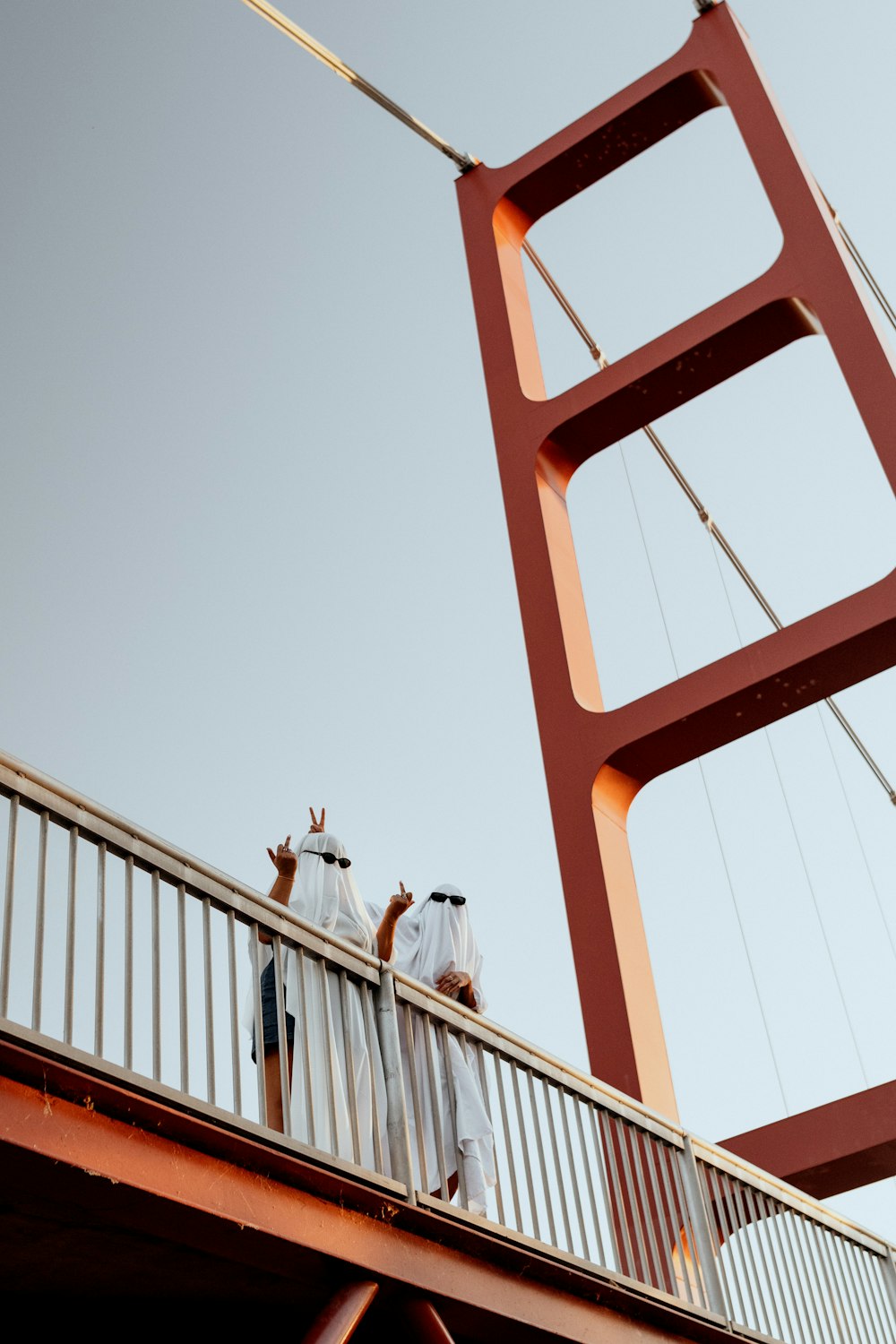 a group of people on a bridge