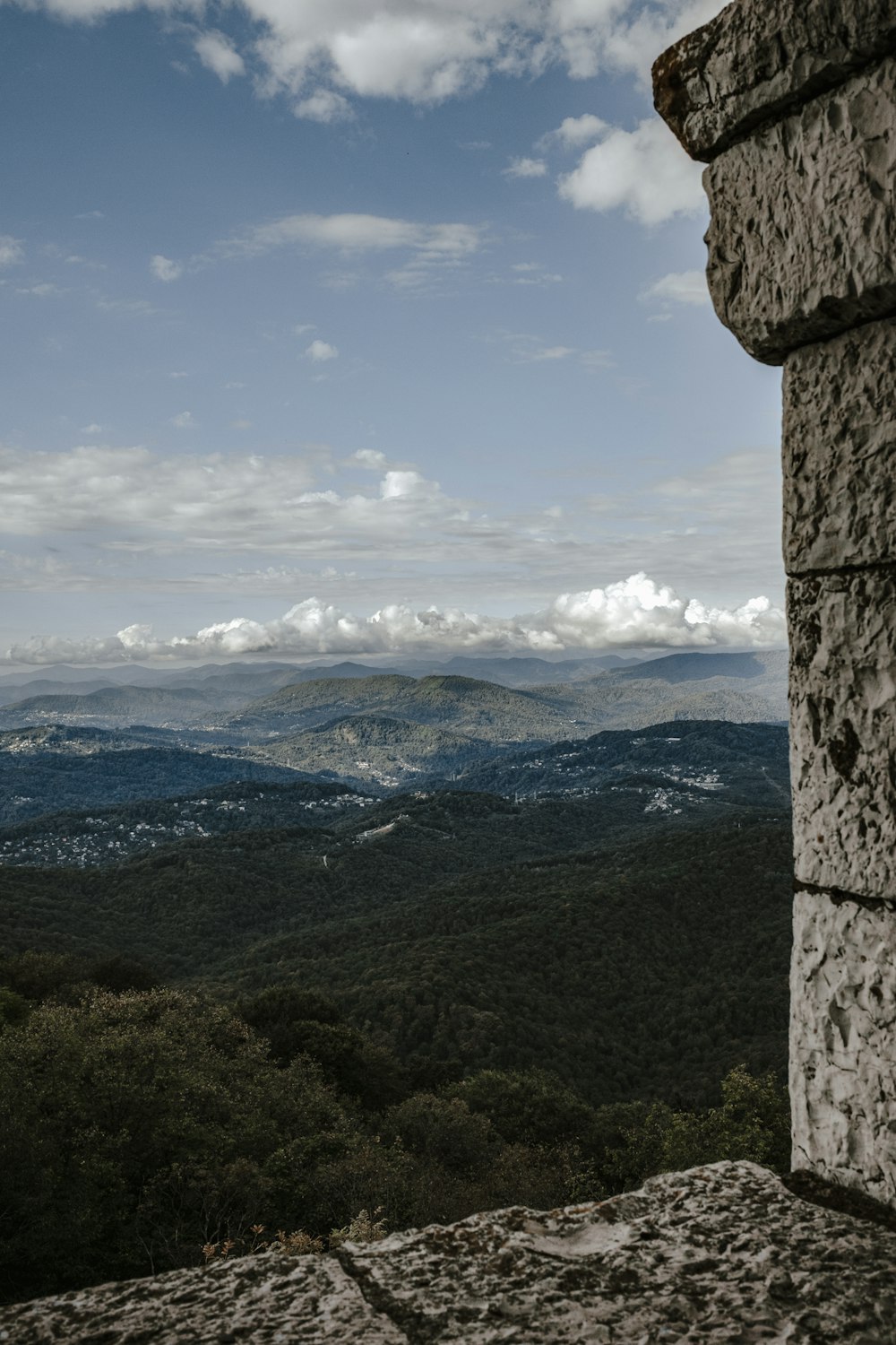 a view of a valley from a cliff