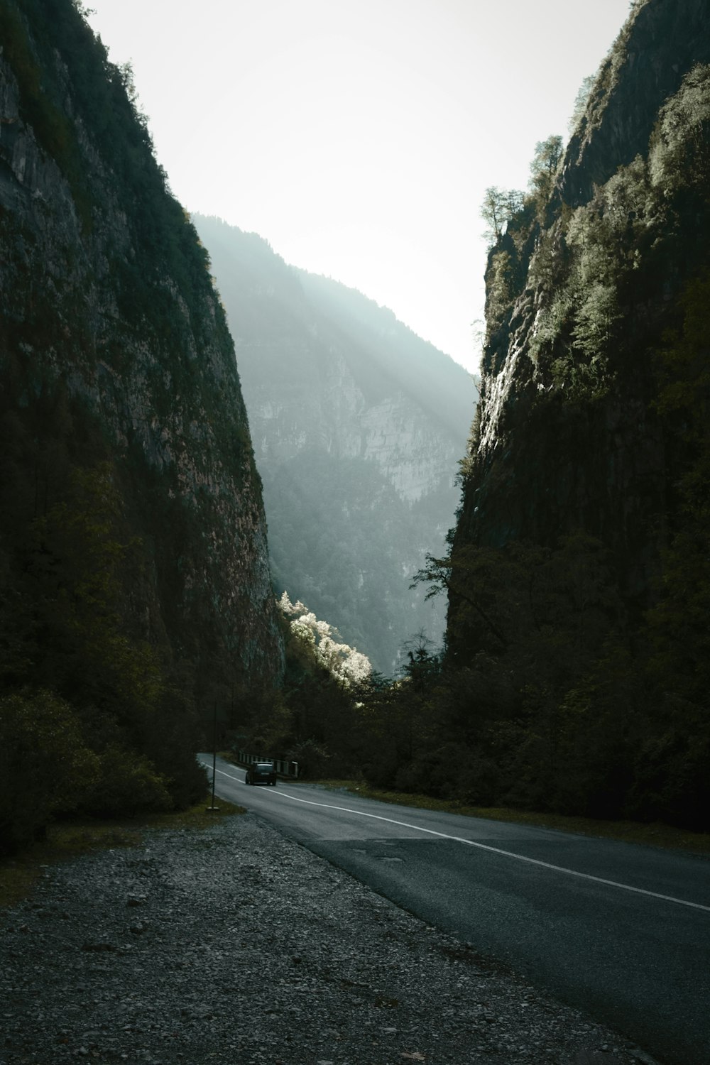 a road between mountains