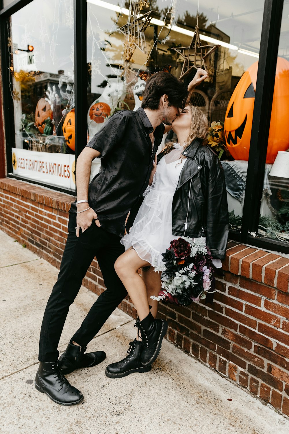 a man and woman kissing