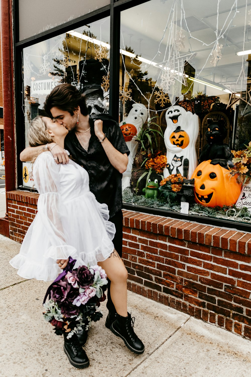 a man and woman kissing