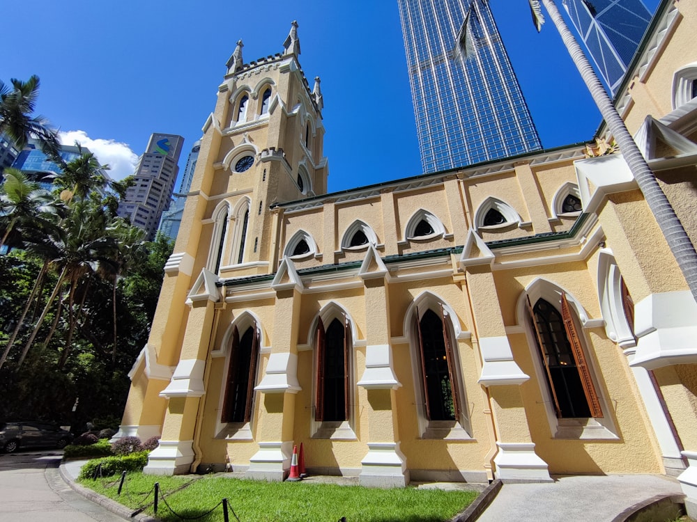 a large church with a tall glass tower