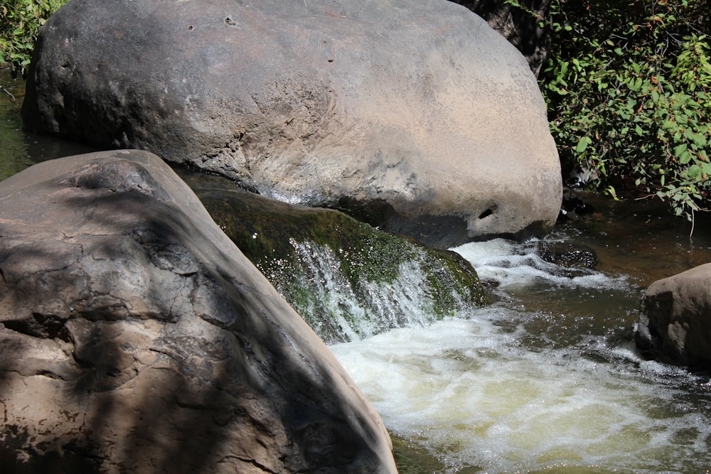 a river flowing between large rocks