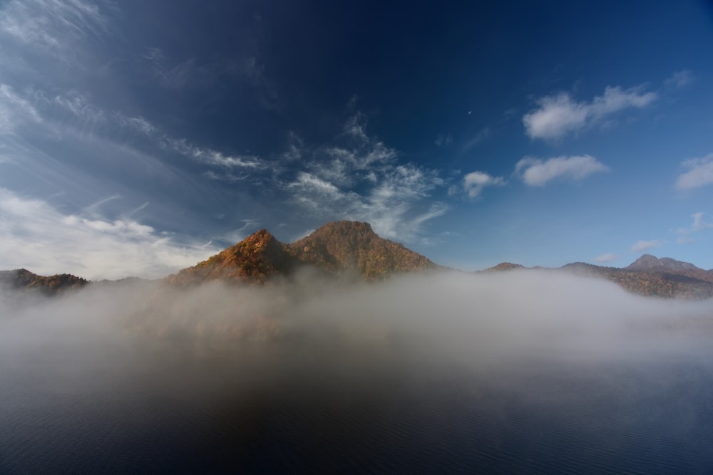 a mountain in the clouds