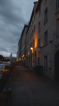 a street with cars parked on the side