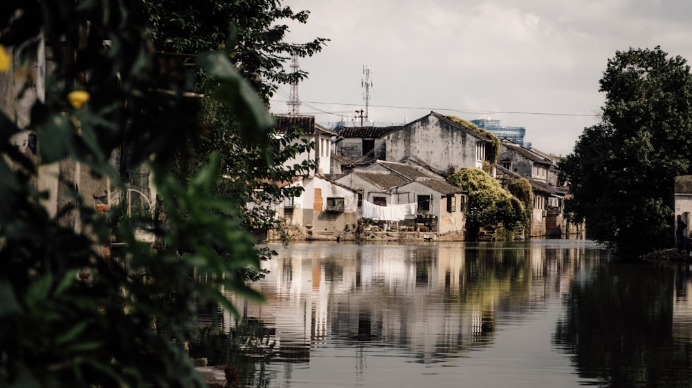 a flooded street with houses