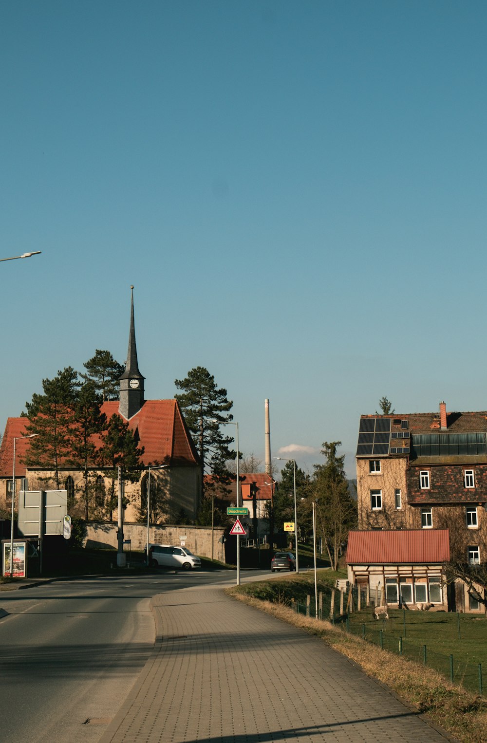 a road with buildings on the side