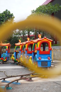Children enjoying a themed train ride experience.