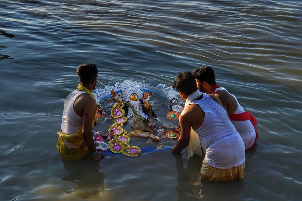 a group of people in the water