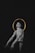 A tattooed person is depicted with intricate and geometric designs covering the upper body. A golden halo encircles the head, providing a stark contrast against the dark background, adding an ethereal quality to the image.