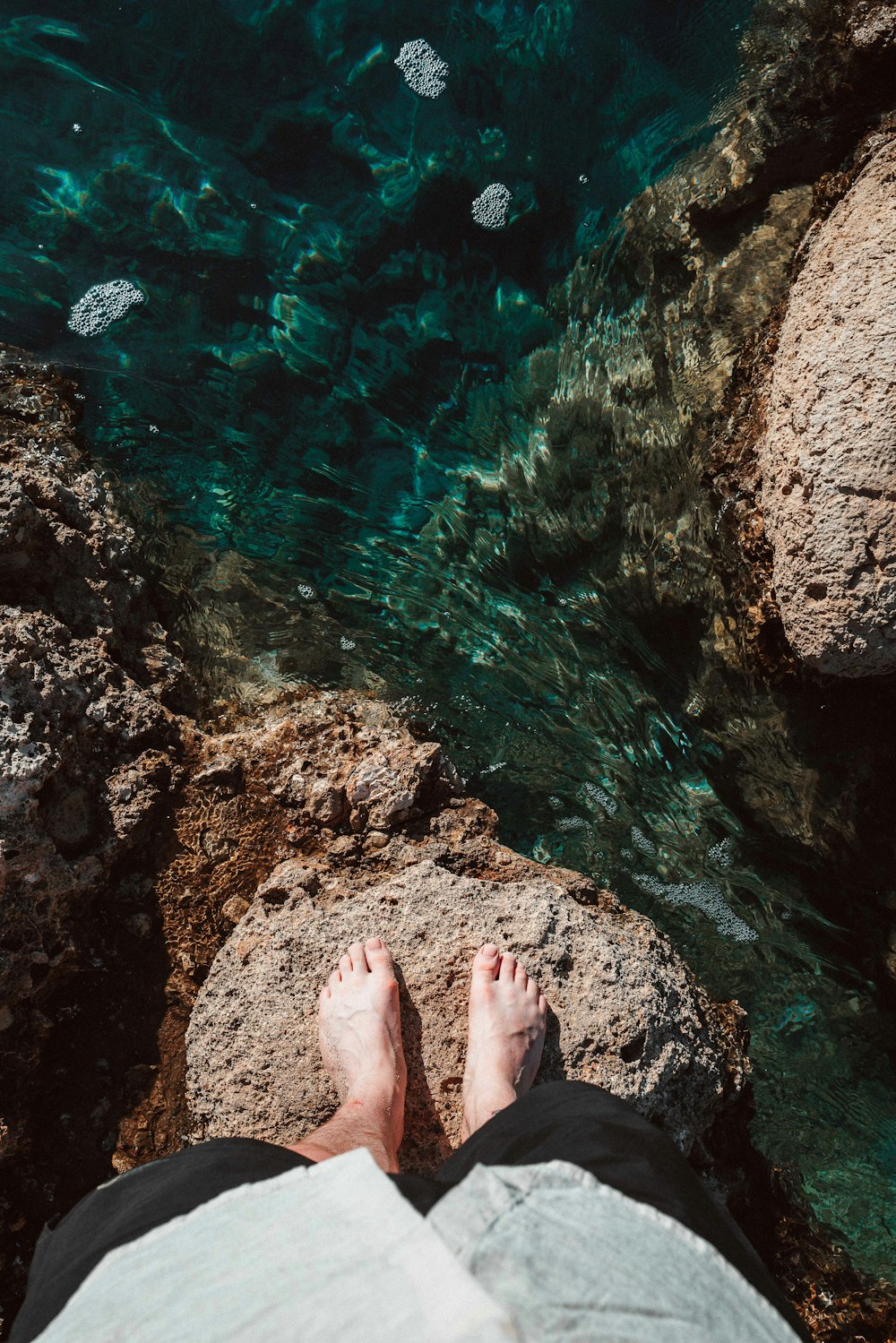 feet on a rock