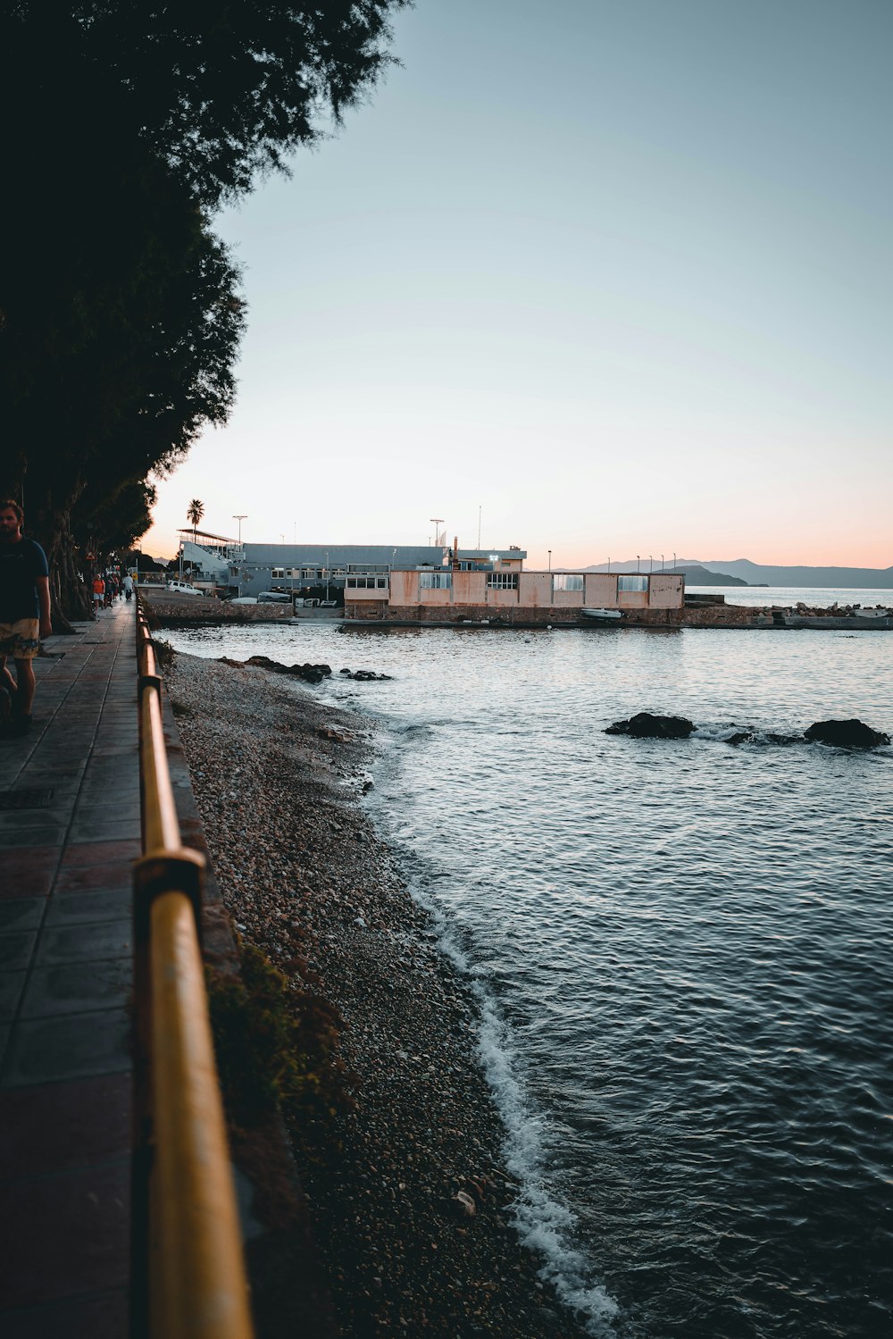 a body of water with buildings along it