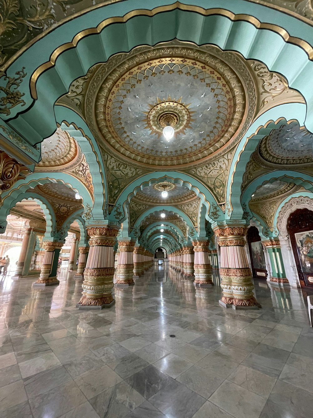 a large ornate ceiling with columns