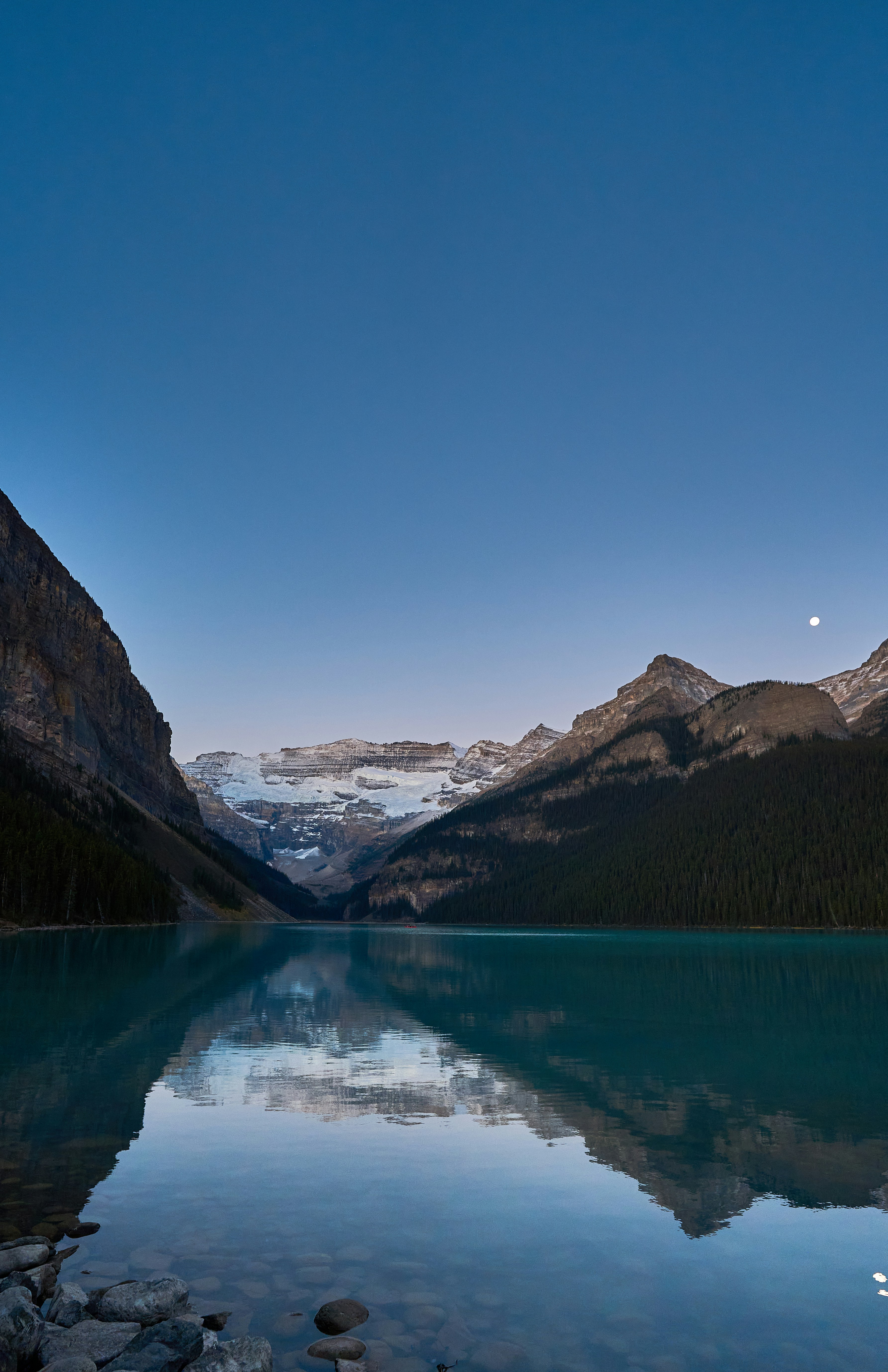 a lake surrounded by mountains