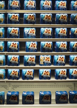 a shelf of canned beverages