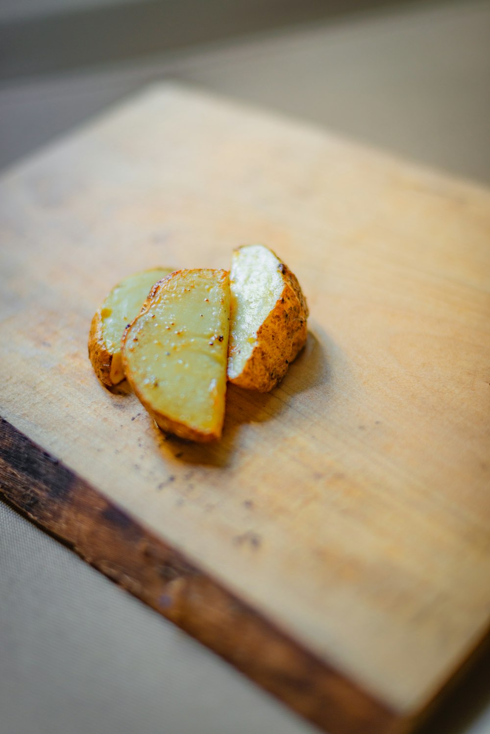 a piece of food on a wooden surface