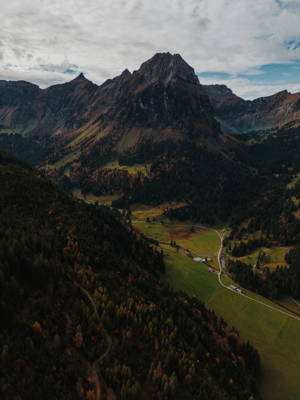 a mountain with a valley below