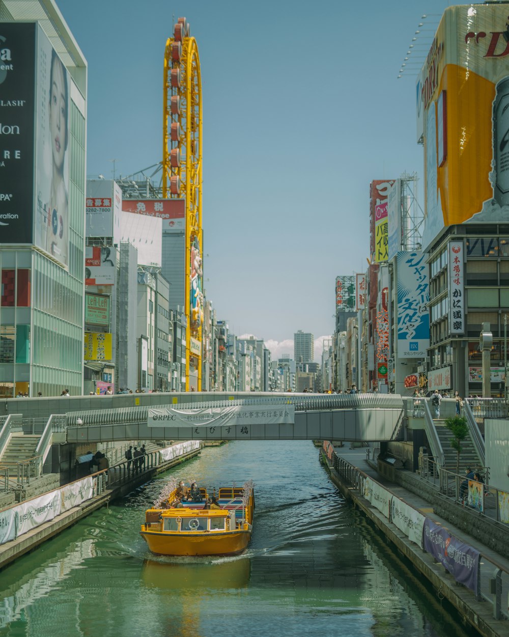 a boat on a river in a city