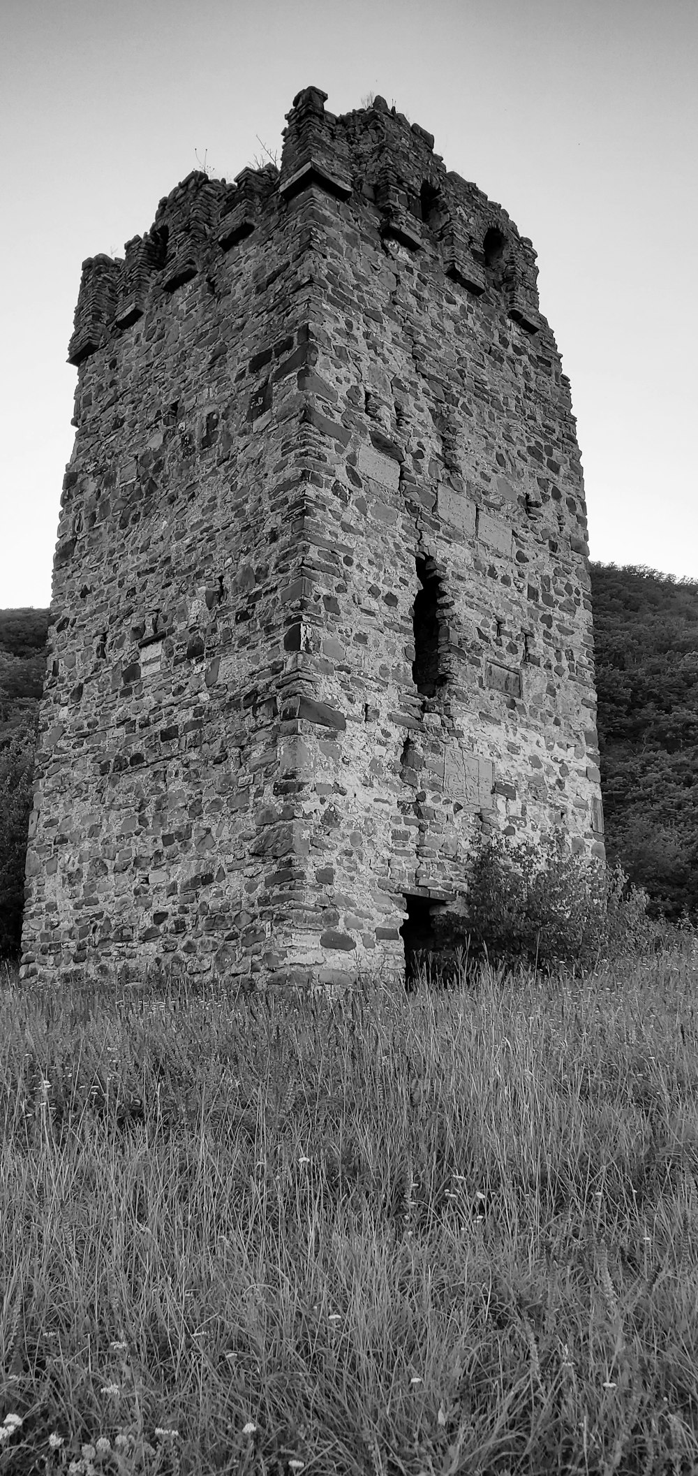 a stone building with a tower