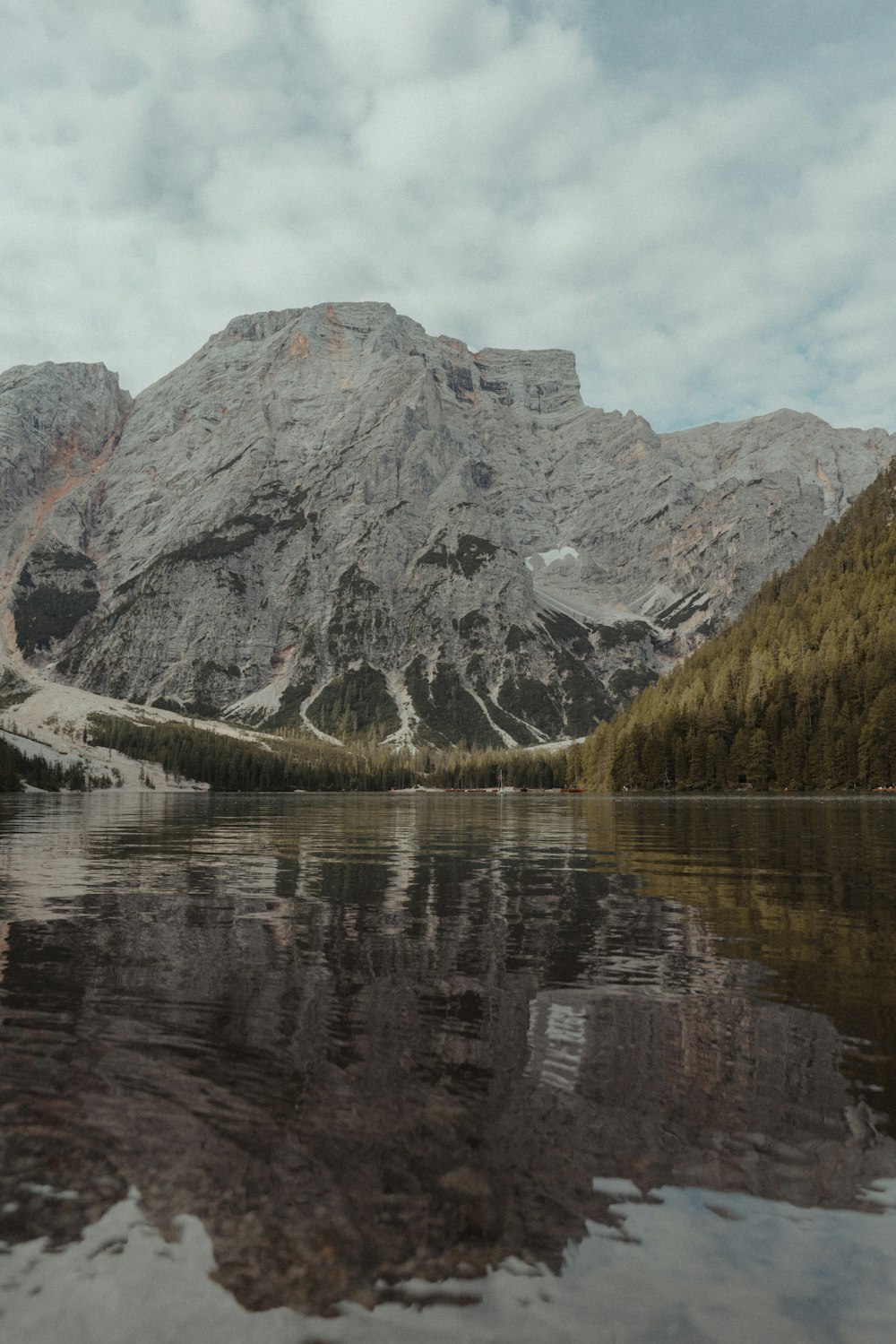 a lake with a mountain in the background