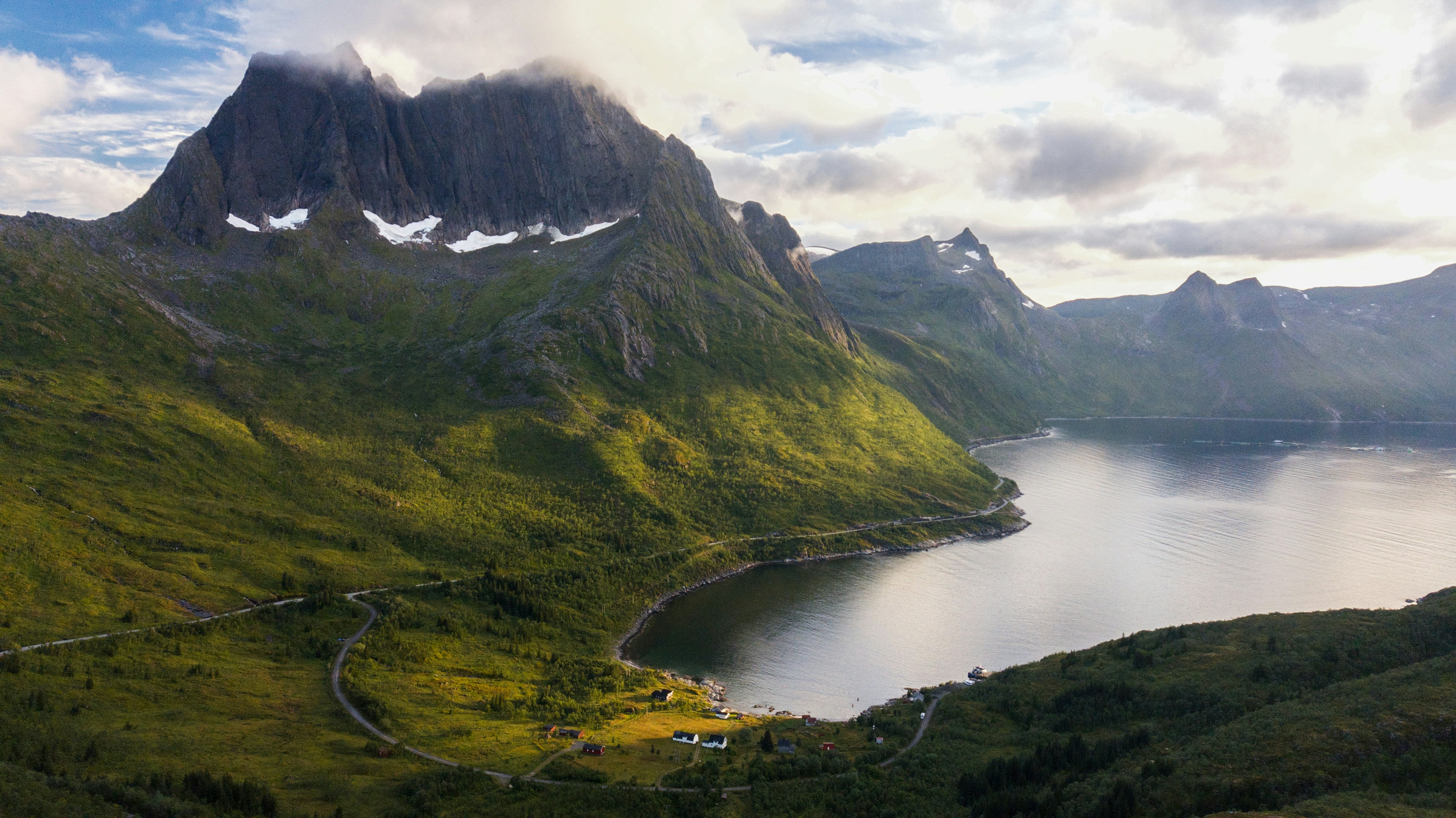 a lake between mountains