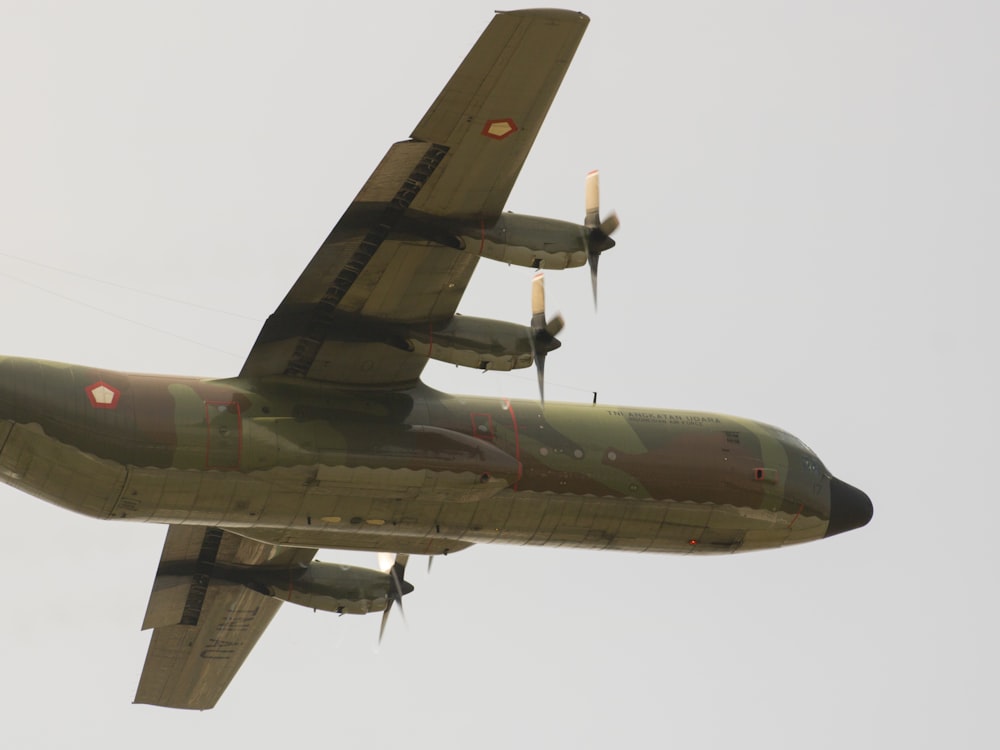 a large airplane flying in the sky