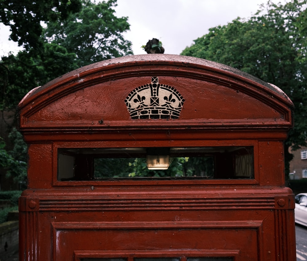 a wooden box with a sign on it