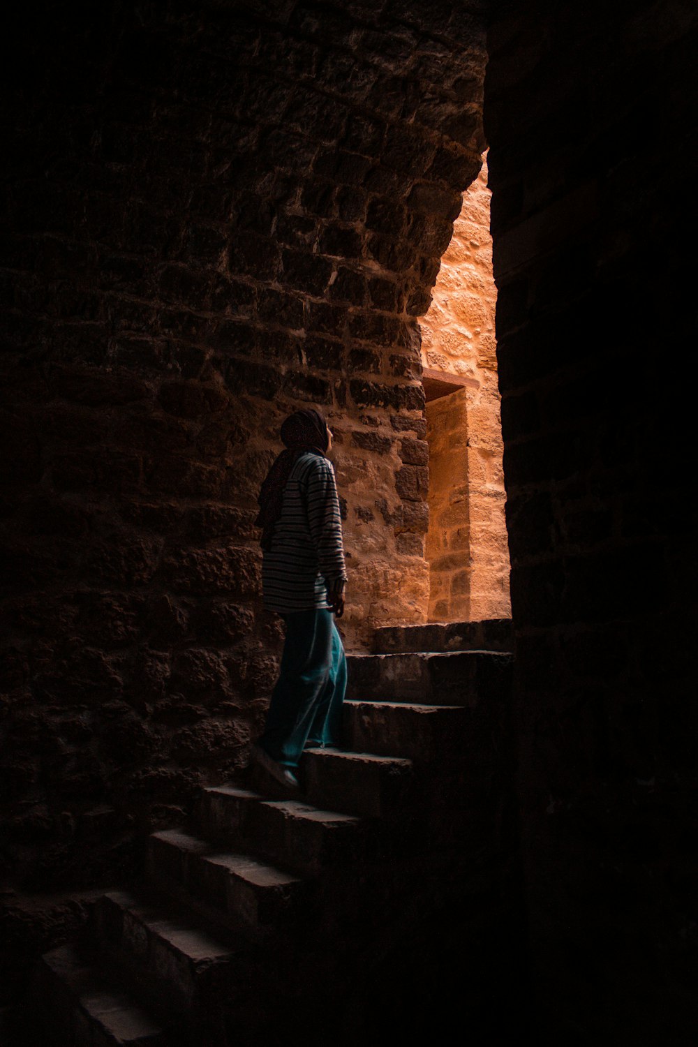 a person walking up a staircase