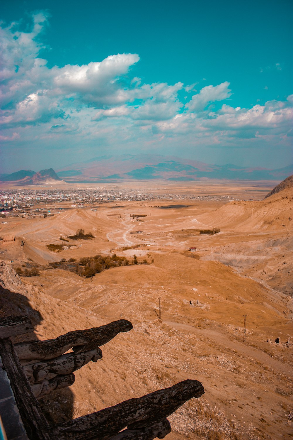 a desert landscape with mountains in the background