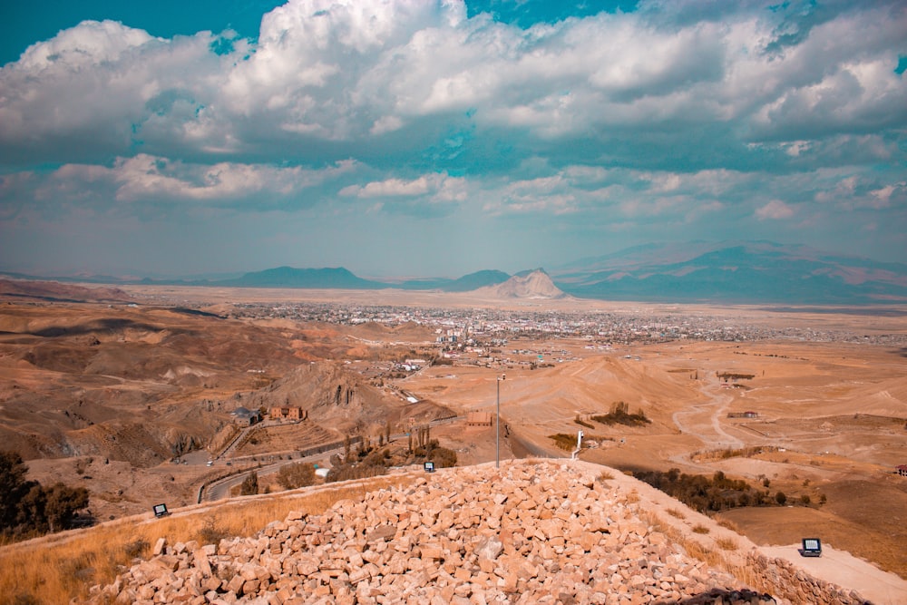 a landscape with a mountain in the distance