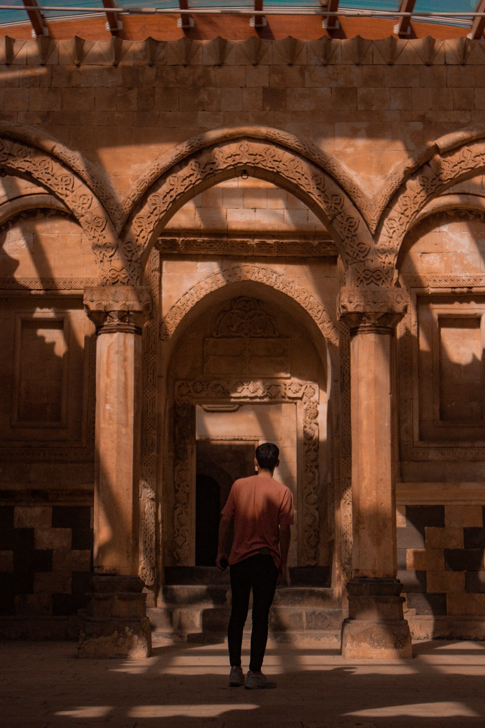 a man walking through a building