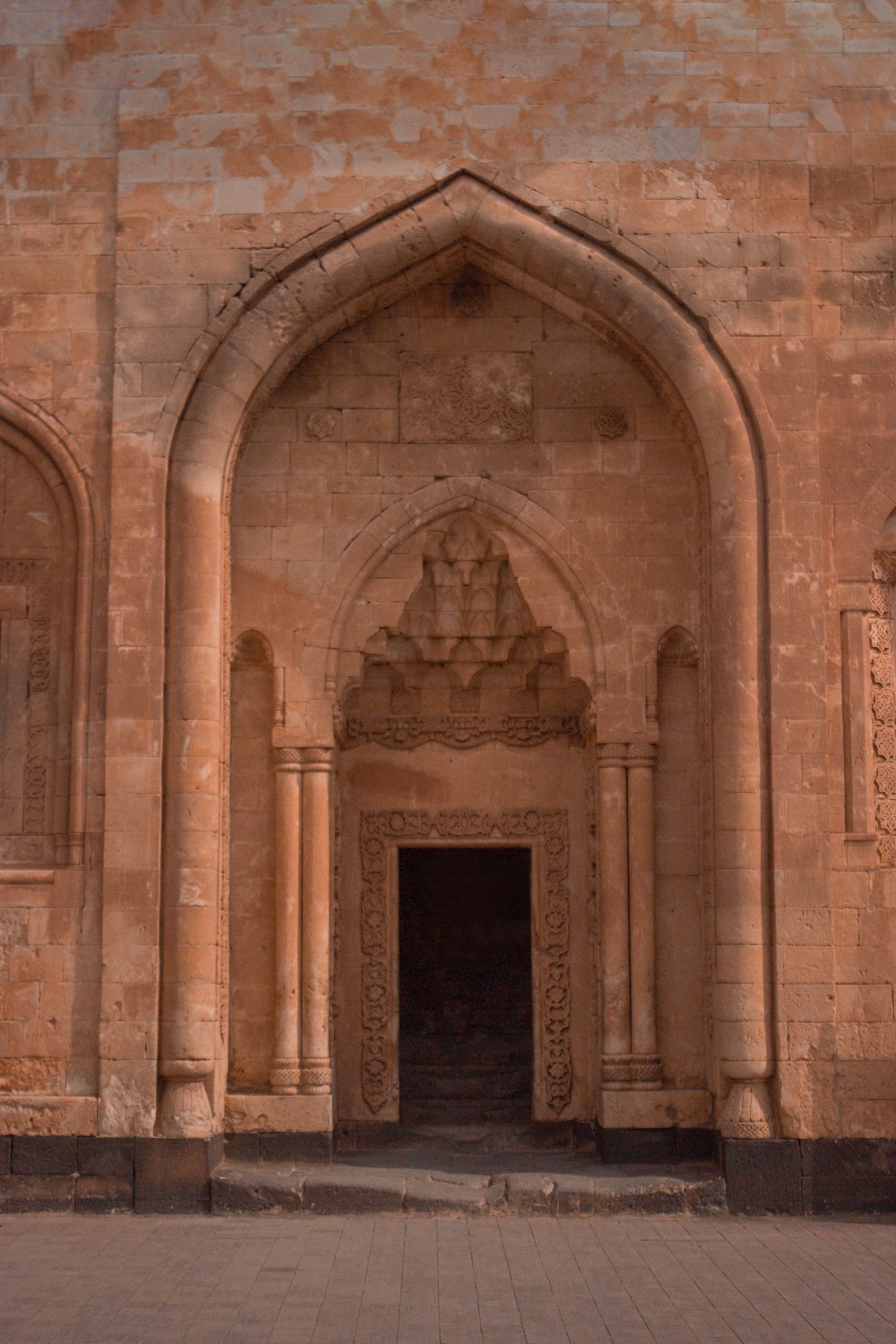 a doorway in a brick building