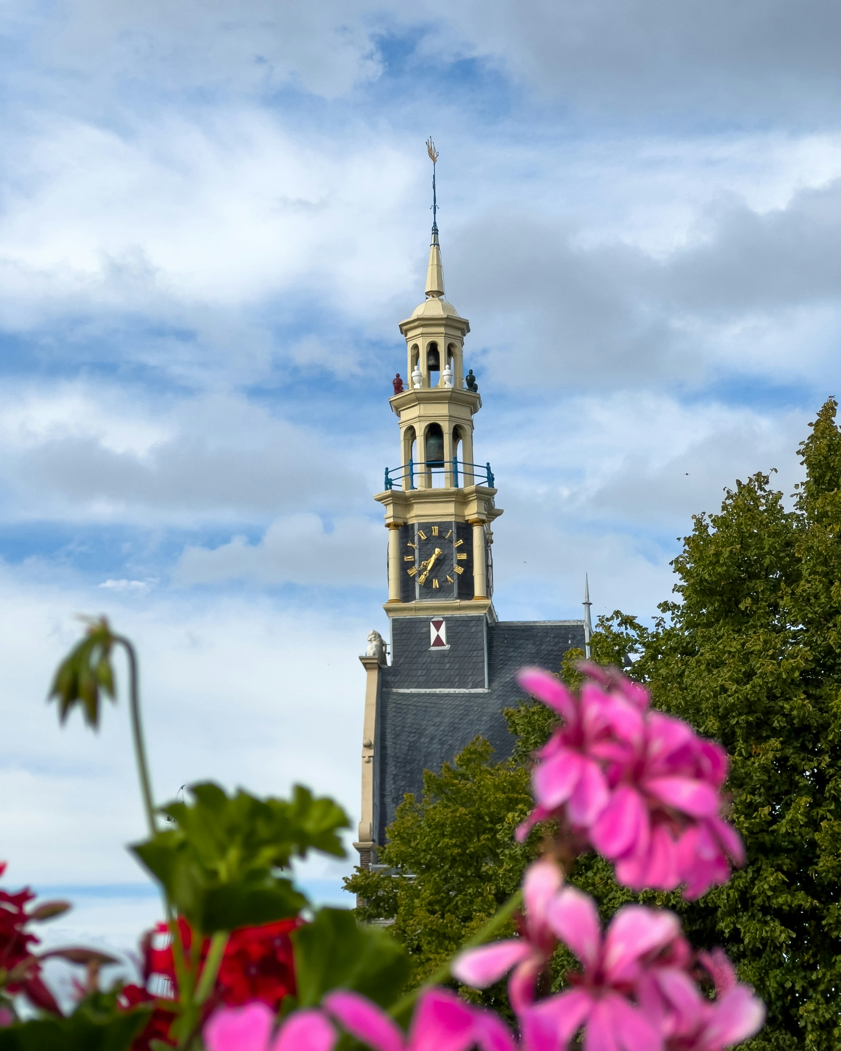 a clock tower with a bell